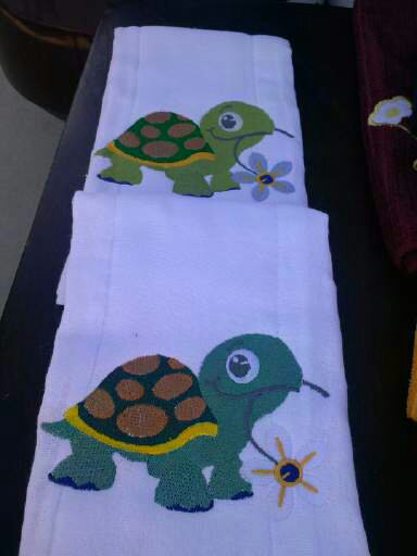 Winnie machine embroderies anything on towels, hats, clothing. Contact her for a special order @ 517-243-0437